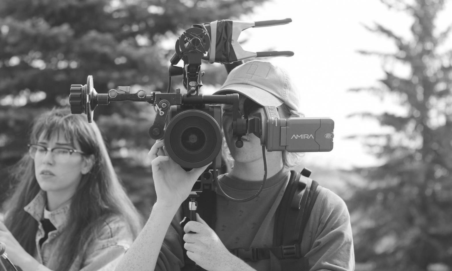 Collaborative editing environment with team reviewing cut sequences on large display