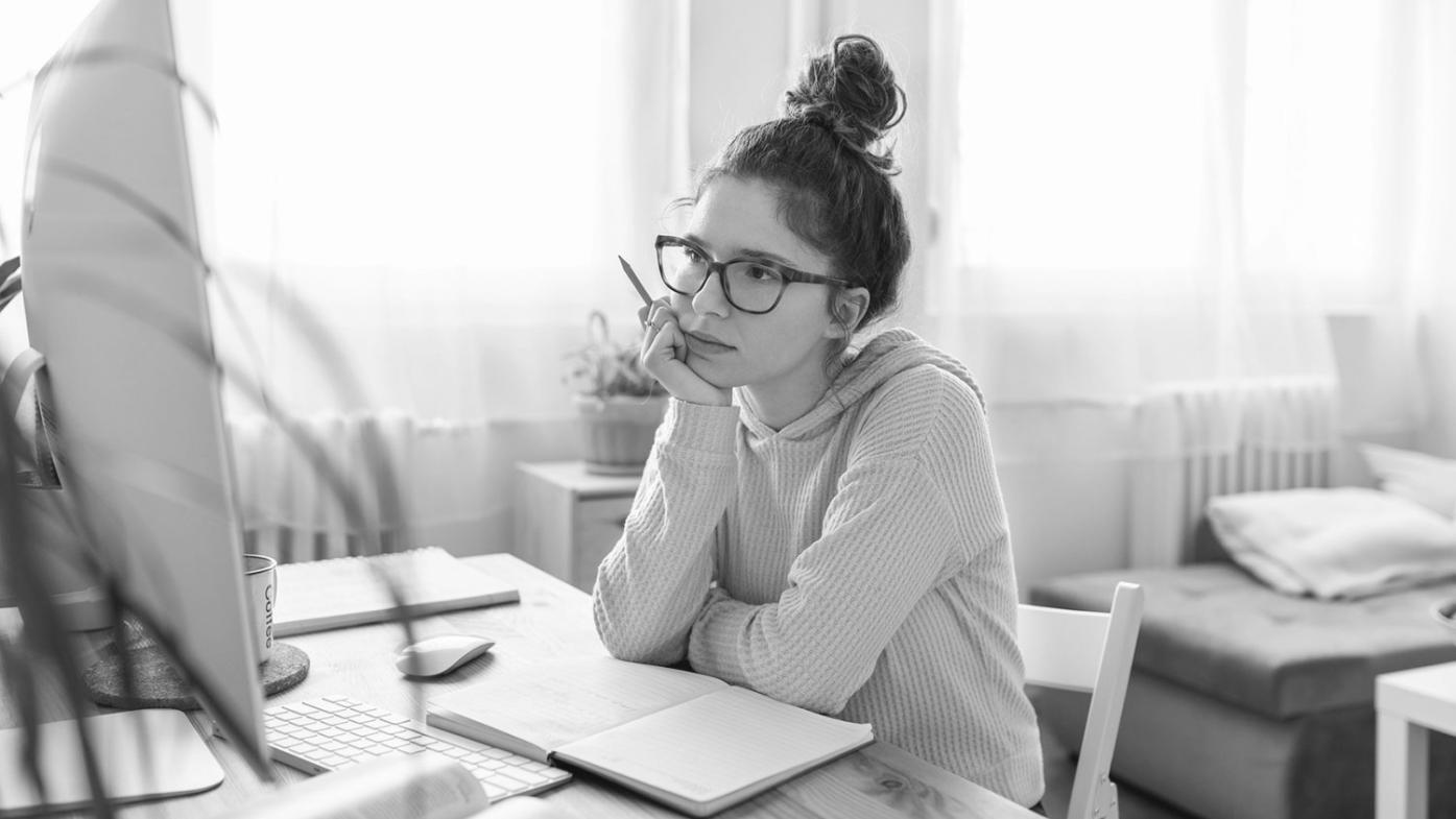 Professional film editing workspace with multiple monitors showing timeline